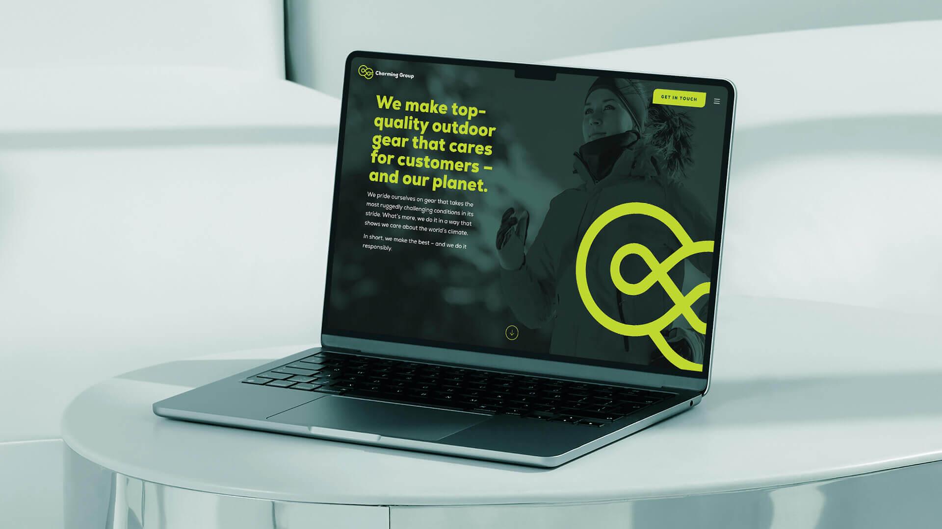 Charming Group Homepage on a Laptop